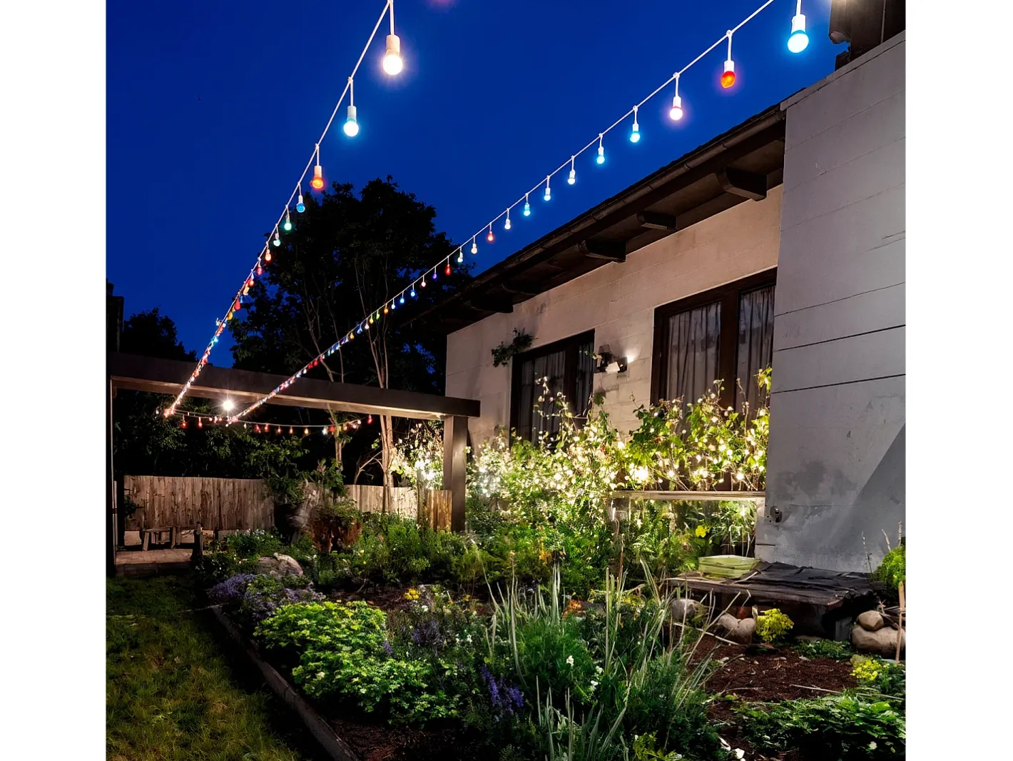 Ledkia Guirnalda Luminosa-Guirnalda Exterior con Bombillas LED E27 5.5m IP65 Blanco Rosa Multicolor
